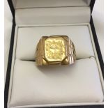 Gents heavy 18ct gold dress ring with engraved decoration. Size W, weight approx 14.8g