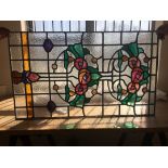 Antique stained glass window - Art Nouveau flower design by T.W.Camm Studio. Includes rippled effect