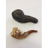 Antique carved meerschaum and amber smokers pipe in an Eagle claw design. In original case.