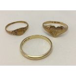 3 gold rings comprising: Signet ring (hallmarked worn flat), 9ct signet ring and a hallmarked 9ct