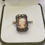 Art Deco ring with 9ct shank and a cameo set in a silver marcasite mount. Size O, total weight 3g.