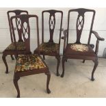 A set of 4 1920's dark oak high back dining chairs. With fan shaped carved detail to backs. 3 chairs