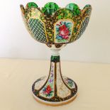 A 19th century Bohemian glass chalice. Green glass with white overlay, hand painted panels of