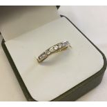 Hallmarked 9ct gold half eternity ring, channel set with 10 cubic zirconias. Size N, total weight