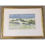 A gilt framed & glazed watercolour of a rural scene by Gordon Jones. 32 x 19cm