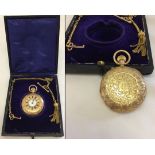An 18ct gold ladies half hunter pocket watch. With engraved decoration to front and back,