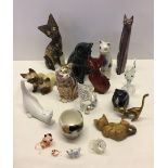 A collection of cat ornaments.