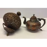 Vintage Tibetan decorative copper teapot, together with a Tibetan pierced copper hanging lamp.