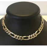 A large 925 silver figaro link necklace.