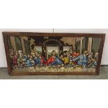 A framed tapestry depicting The Last Supper. Approx 42 x 93cm.