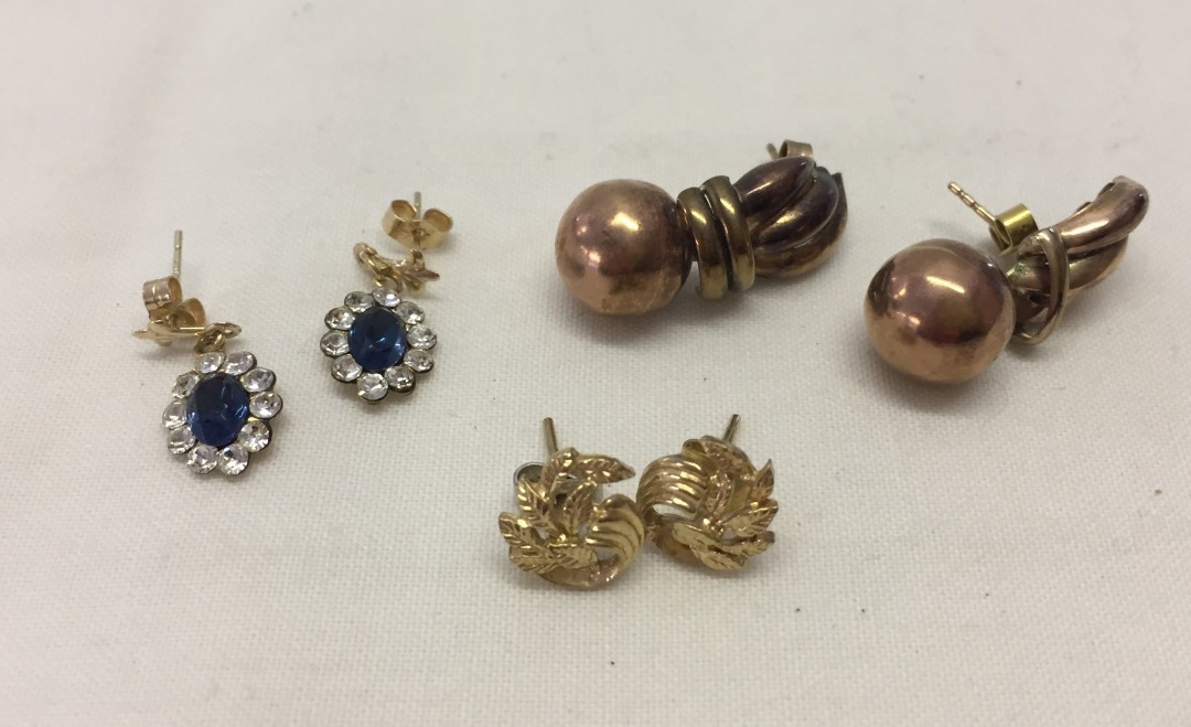 3 pairs of 9ct gold earrings, one set with blue & white stones.