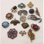 A collection of vintage brooches mostly set with diamante.