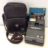 A Kodak EK160-EF Instant Camera together with original manuals & case.