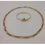 A silver gilt bracelet with Claddagh decoration, together with a gold plated link chain necklace.