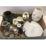 A box of mixed ceramic items.