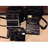 Kodak EK 160-EF Instant cameras together with a Kodak EK 6 instant camera and a Fuji Discovery.