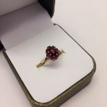 Silver dress ring set with garnets.