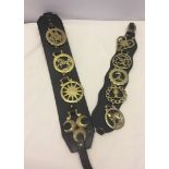 2 sets of horse brasses on leather straps.