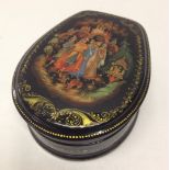 A hand painted fairytale Russian lacquer box, horseshoe shape in Palekh style.
