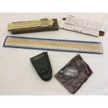 3 vintage rules/slide rules with conversion tables.