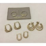 4 pairs of assorted 9ct gold small hoop earrings.