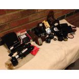 A collection of miscellaneous photographic equipment.