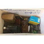 A box of assorted cameras.