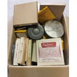 A box containing a large quantity of 8 & 16mm cine films.