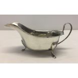 A silver sauce boat.