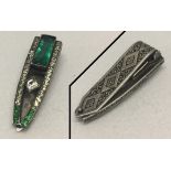 An Art Deco silver paste dress clip.