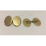 A pair of 15ct gold men's cufflinks.