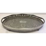 A silver plated tray with gallery and ball & claw feet together with a silver plated vegetable dish