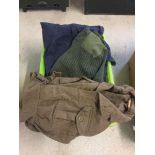 A box of assorted vintage military uniform & clothing.