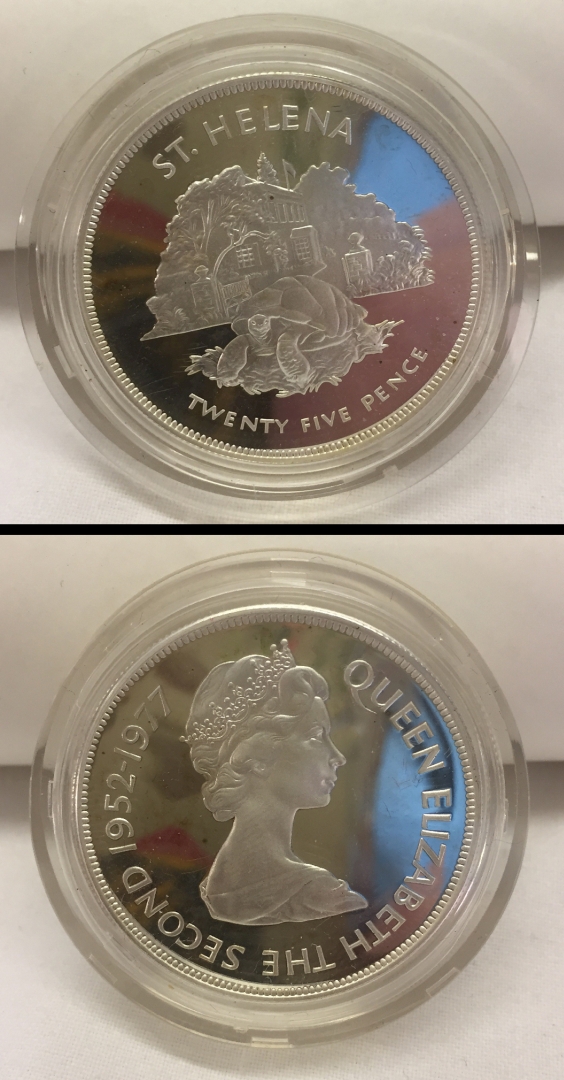 A cased silver proof St Helena Twenty five pence coin.