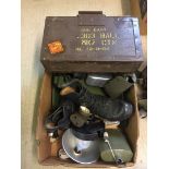 A box of assorted military items.