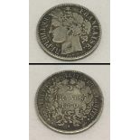 An 1870 silver french 2 franc coin.