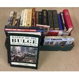 A box of misc military related books.