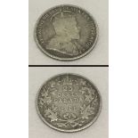 A silver Canadian 25 cents coin. Dated 1906.