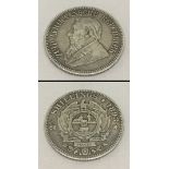 A cased silver South African 2 1/2 shilling coin.