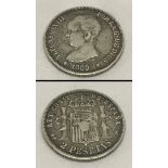 An 1889 silver 2 Pesatas coin.