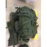 A military back pack and webbing.