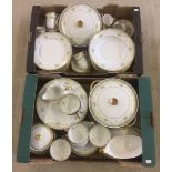 A large quantity of Heinrich, Germany dinner & tea ware with pale green and gilt decoration.