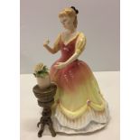 A ceramic Royal Doulton 'Sarah' figurine.