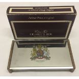 An Arthur Price stainless steel commemorative cigarette box.