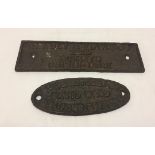 2 cast iron agricultural advertising wall signs.