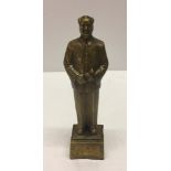 A hollow bronze figurine of Mao-Tse-Tung.