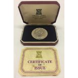 An Isle of Man silver crown, 1977 with box & CoA.