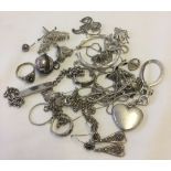 A bag of silver/white metal scrap jewellery.