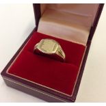 A 9ct gold gents signet ring with blank cartouche.