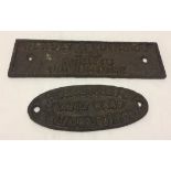 2 cast iron agricultural advertising wall signs.